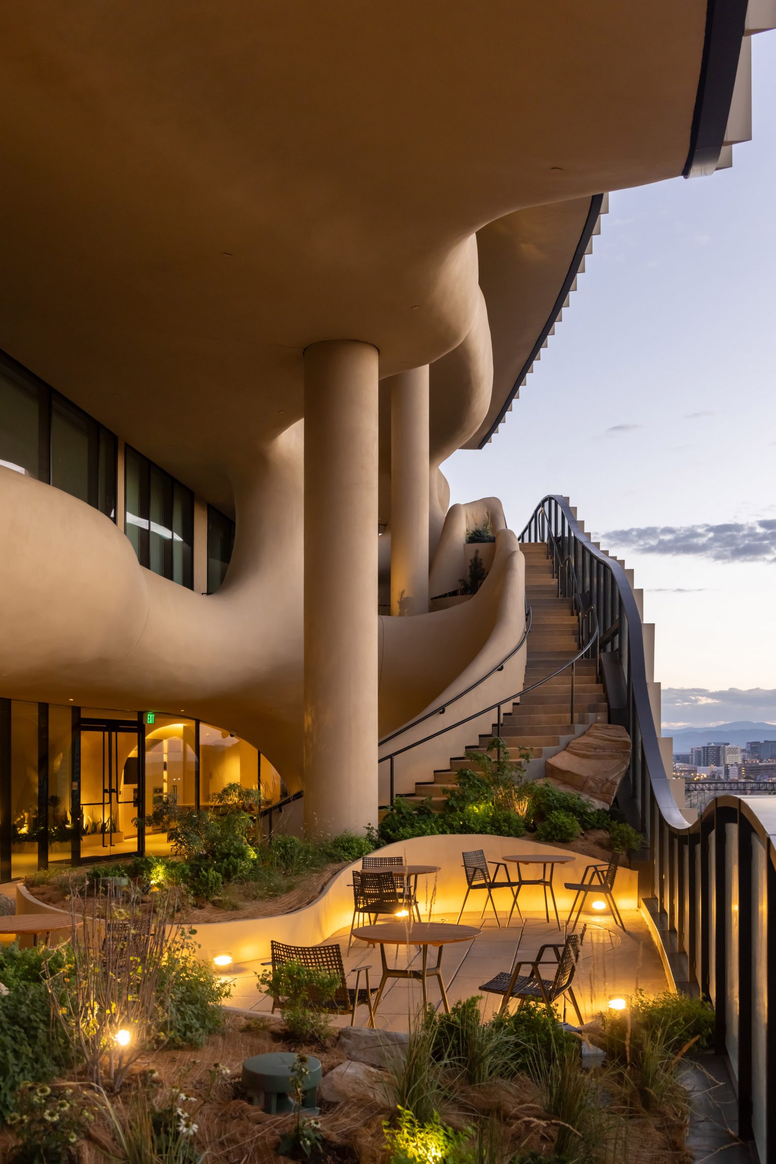 Canyon in glass apartment building nighttime terrace close up