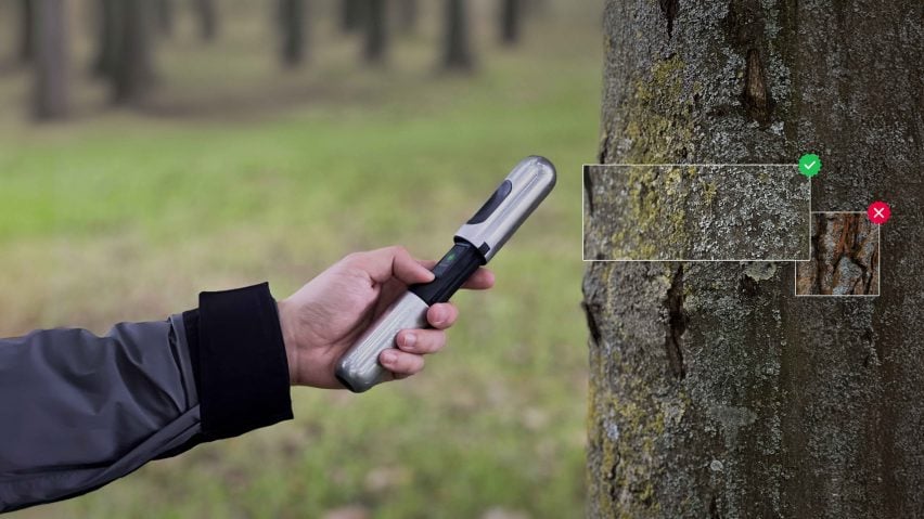 Hanju Seo's EarthCode handheld device scanning tree bark