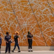 People standing in front of facade