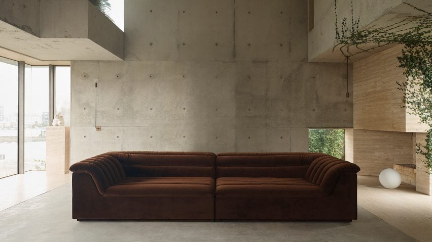 Float sofa by Sarah Ellison in a concrete interior