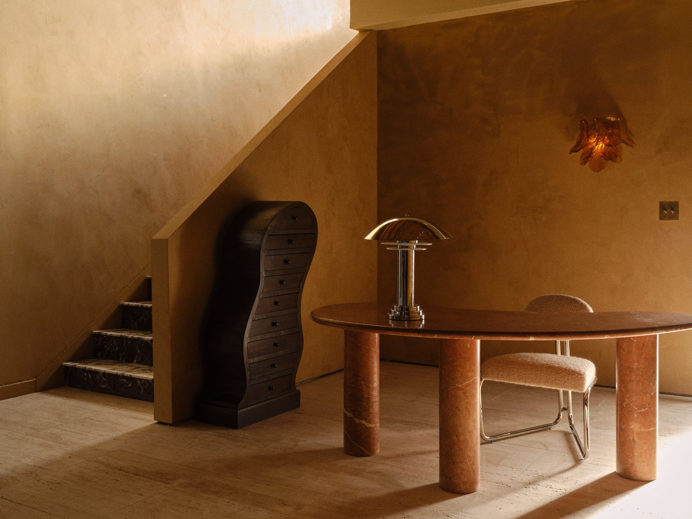 Desk setup in stone furniture showroom in LA