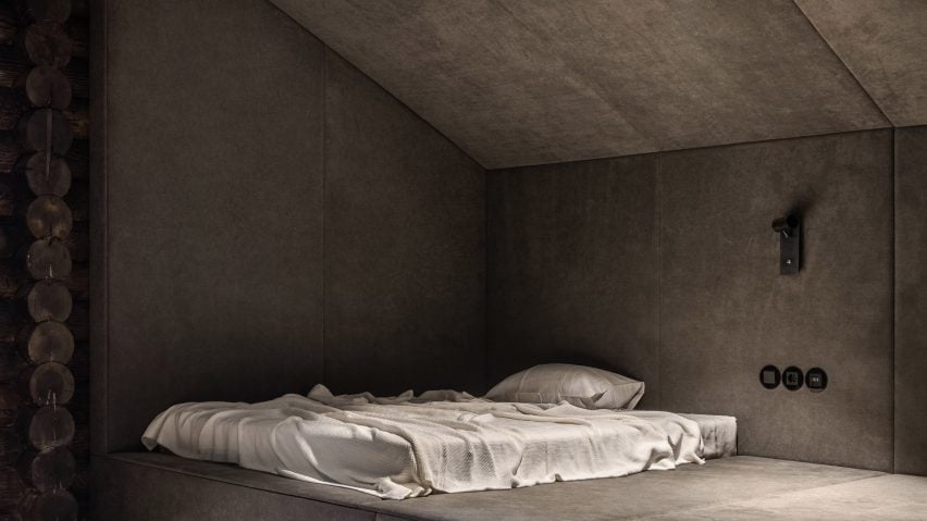 Dark bedroom with slanted ceiling