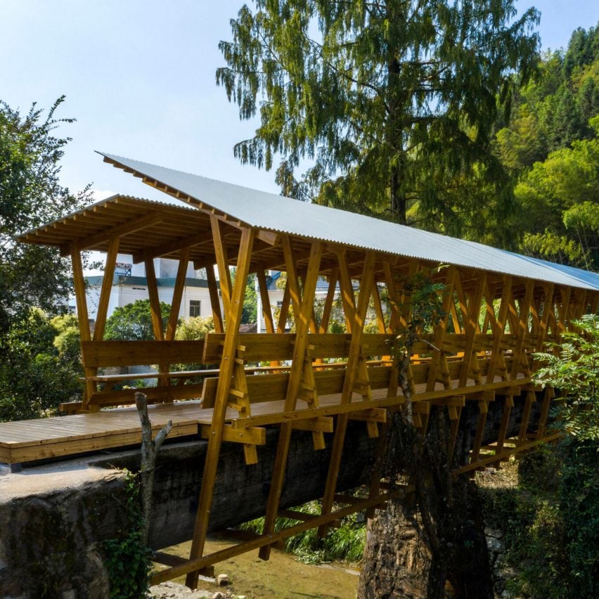 AW2’s four wooden cabins emerge amid treetops like blossoming buds in france