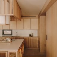 Kitchen island and wood elements in apartment