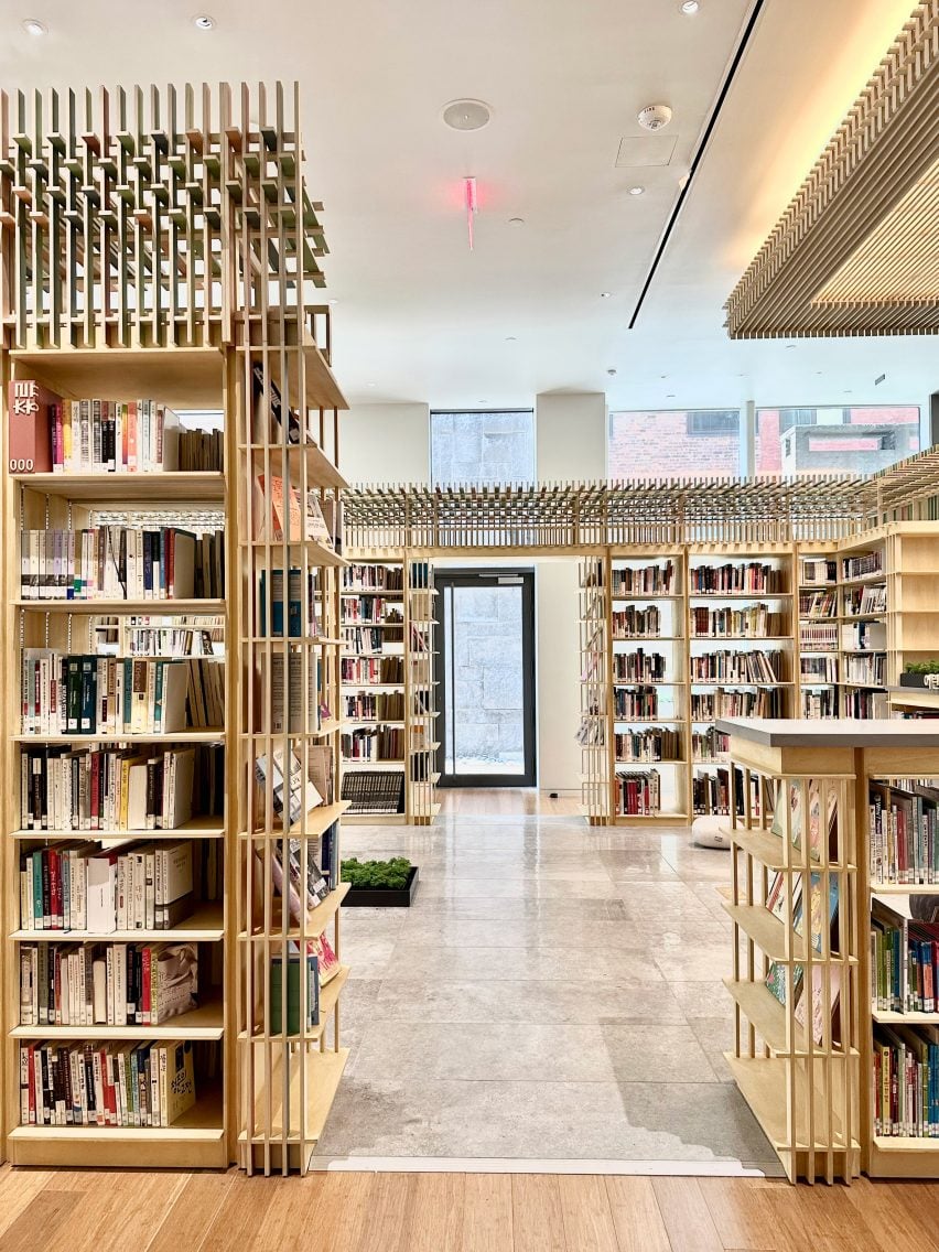 Bookshelves joined to resemble traditional Korean architectural details