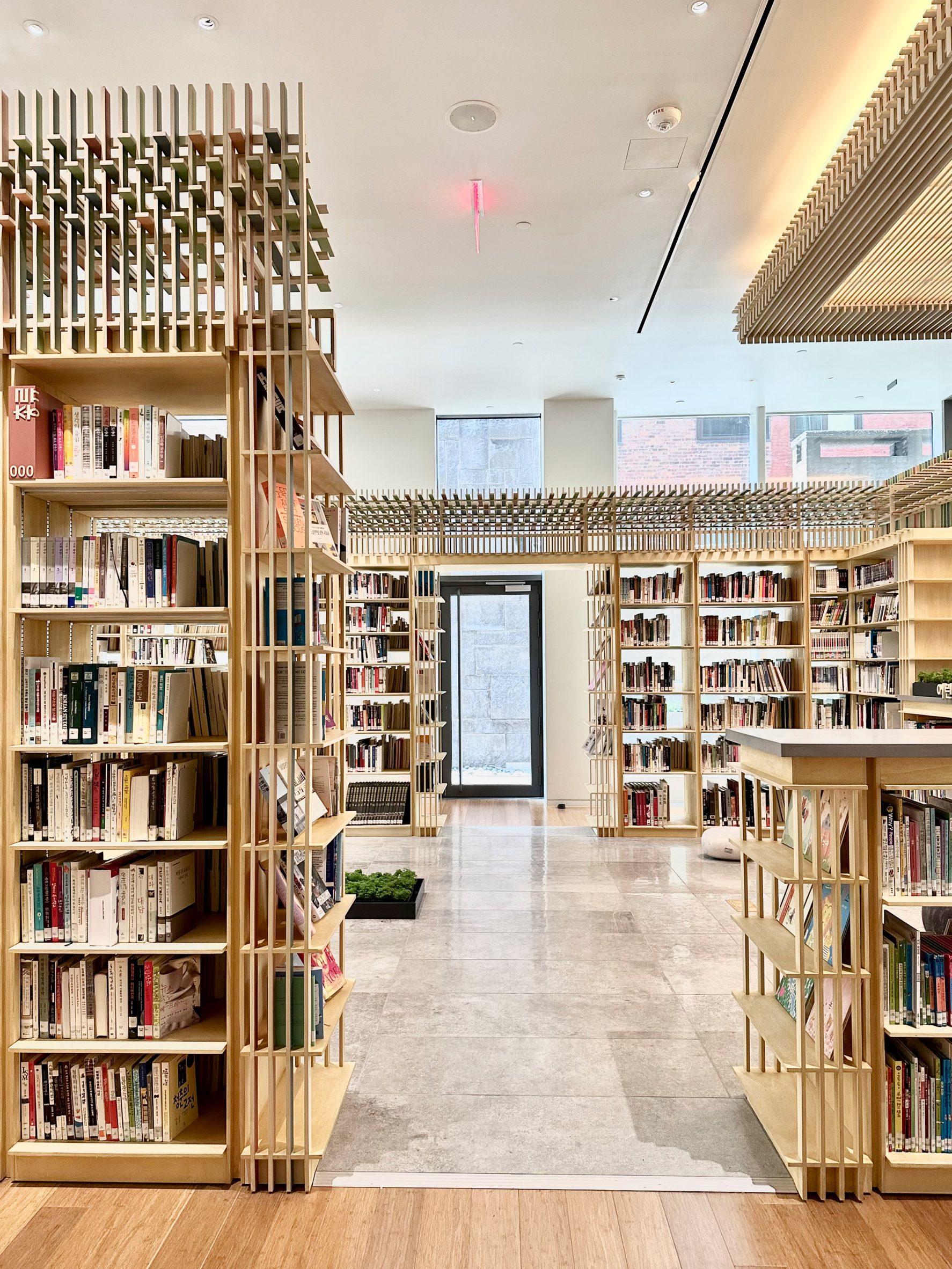 Bookshelves joined to resemble traditional Korean architectural details