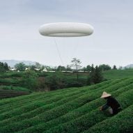 Line+ Studio floats doughnut-shaped weather balloon above rural Chinese landscape