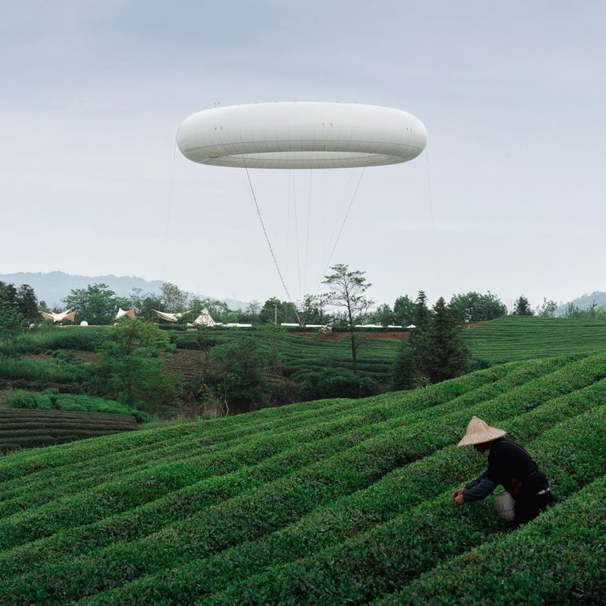 Line+ Studio floats doughnut-shaped weather balloon above rural Chinese landscape