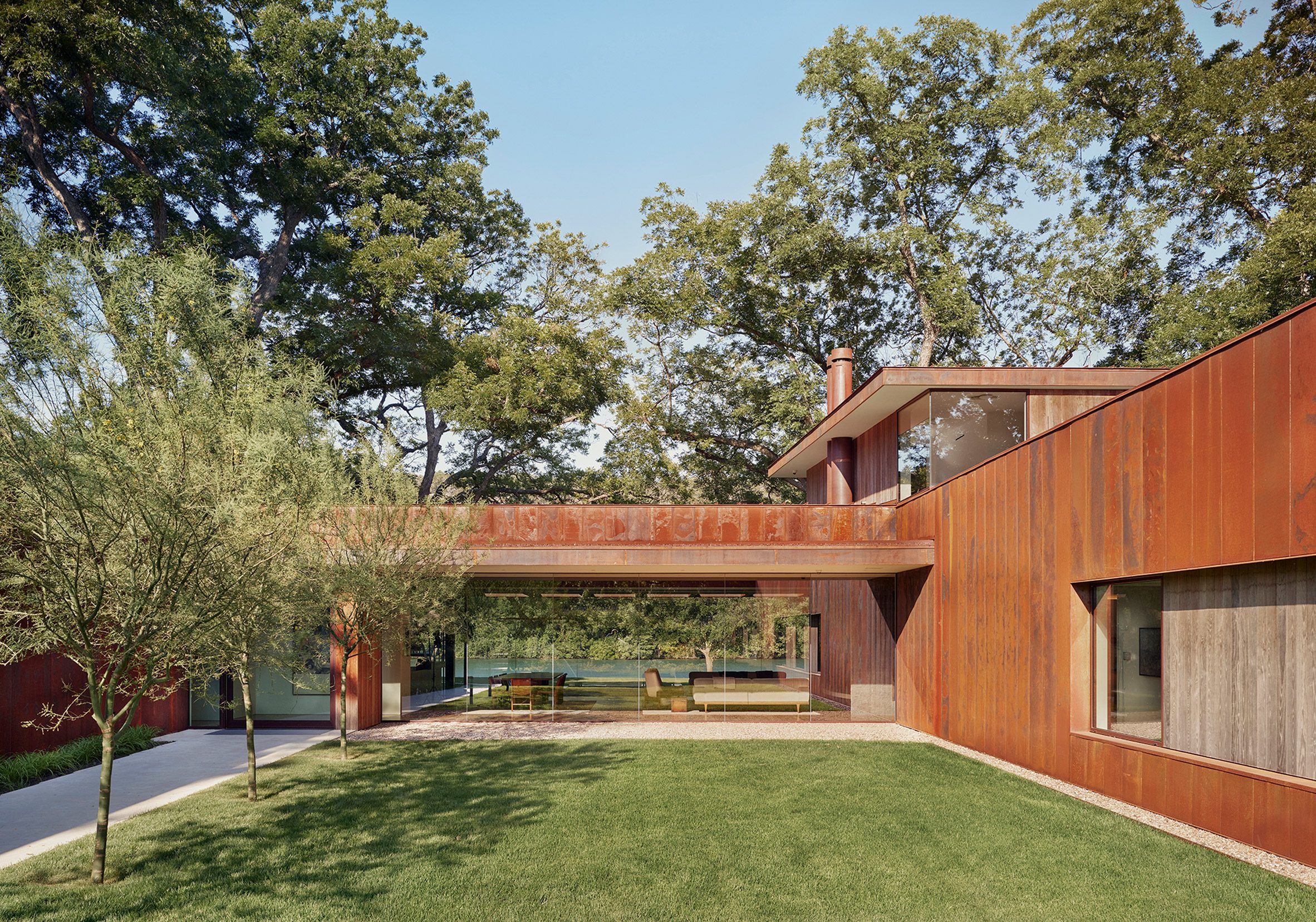 Courtyard of Lakeside retreat by Miró Rivera Architects