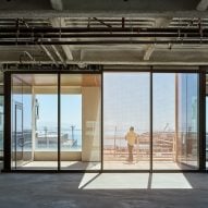 Person looking out over balcony