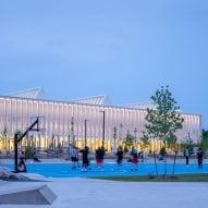 MJMA Architecture & Design marries wood and mesh for Canadian sports centre