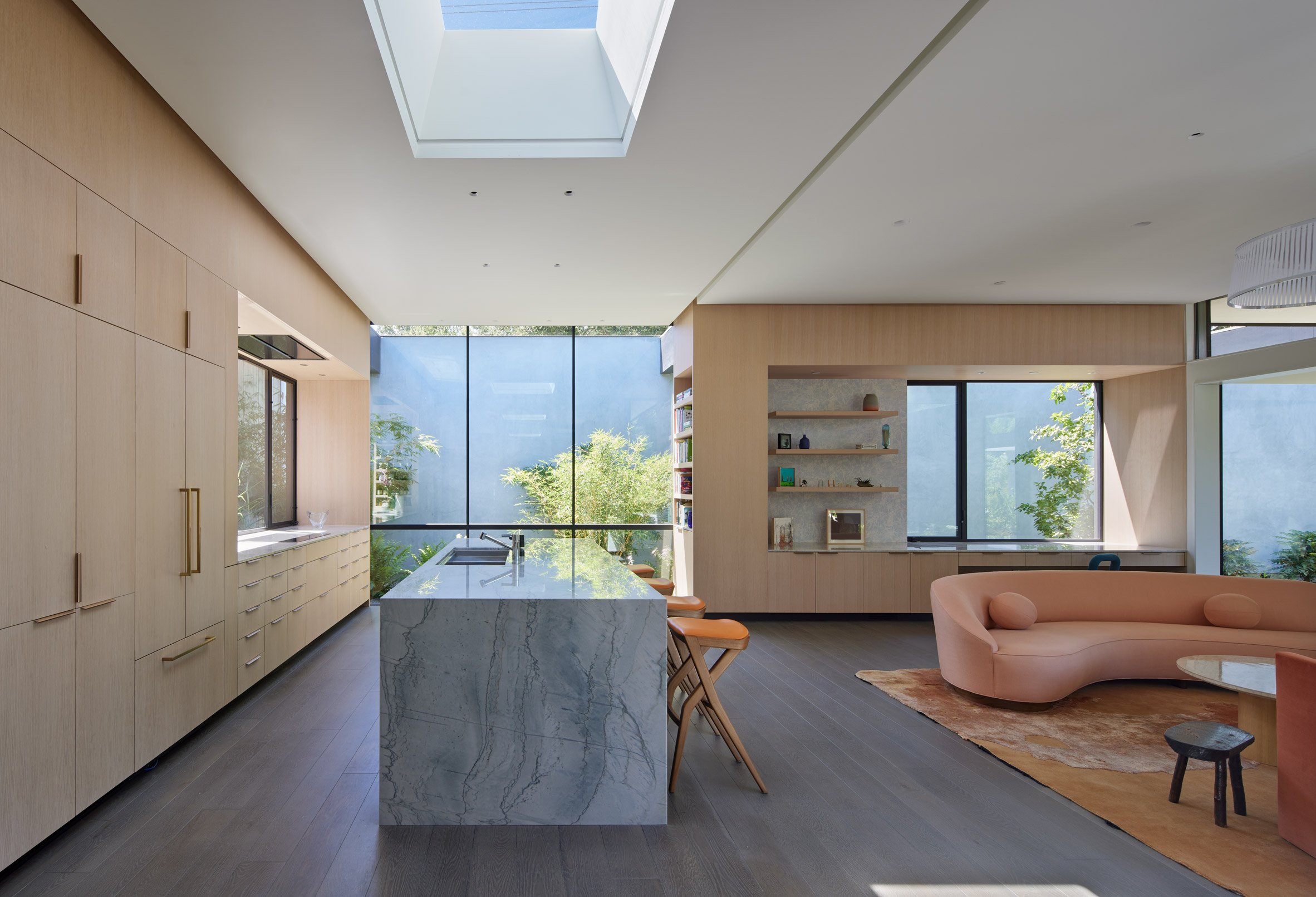 Living room with skylight on California house by Schwartz and Architecture