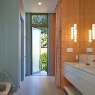 Bathroom with terrarium of California house by Schwartz and Architecture