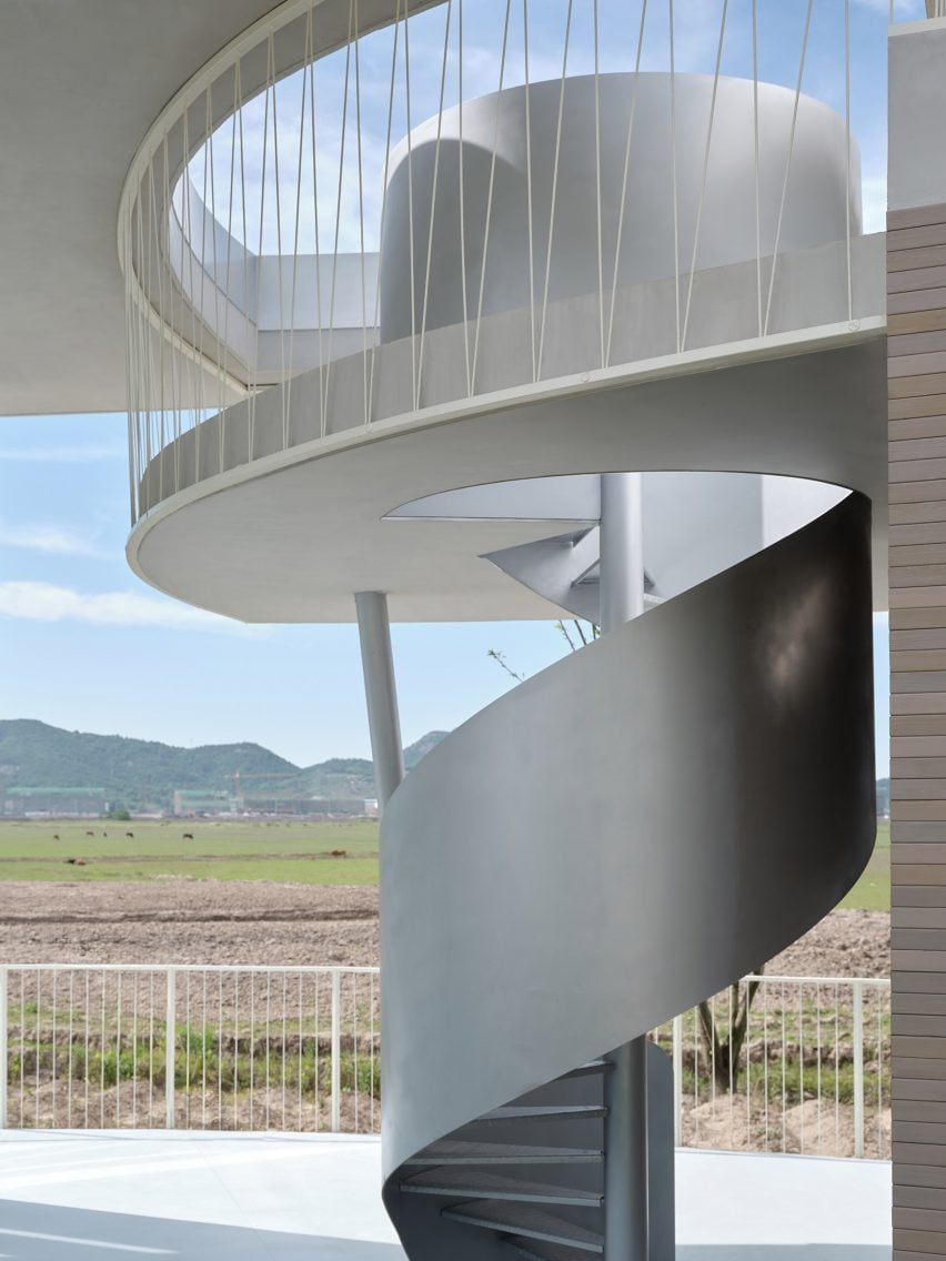 Spiral staircase within stopping station by Mur Mur Lab