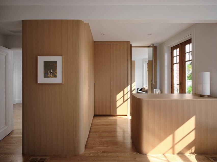 White oak closets with rounded corners