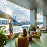 People overlooking water