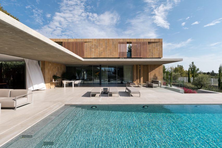 Swimming pool within Greek home by Point27 Architects