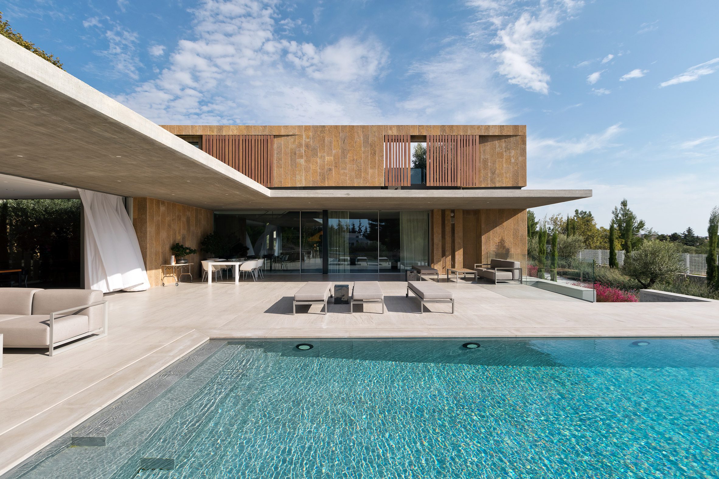 Swimming pool within Greek home by Point27 Architects