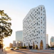 Studio Gang wraps hotel in perforated facade informed by Aspen trees