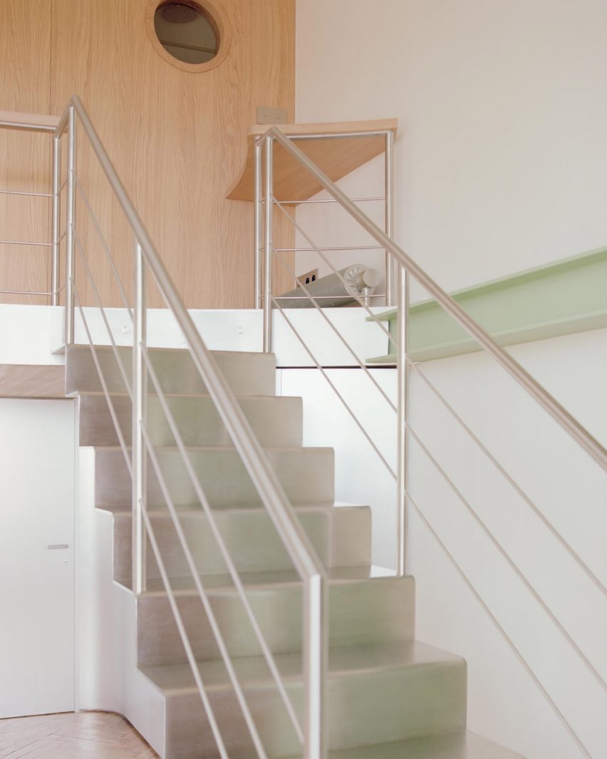 Stairs up to mezzanine within The Lighthouse apartment in Biarritz