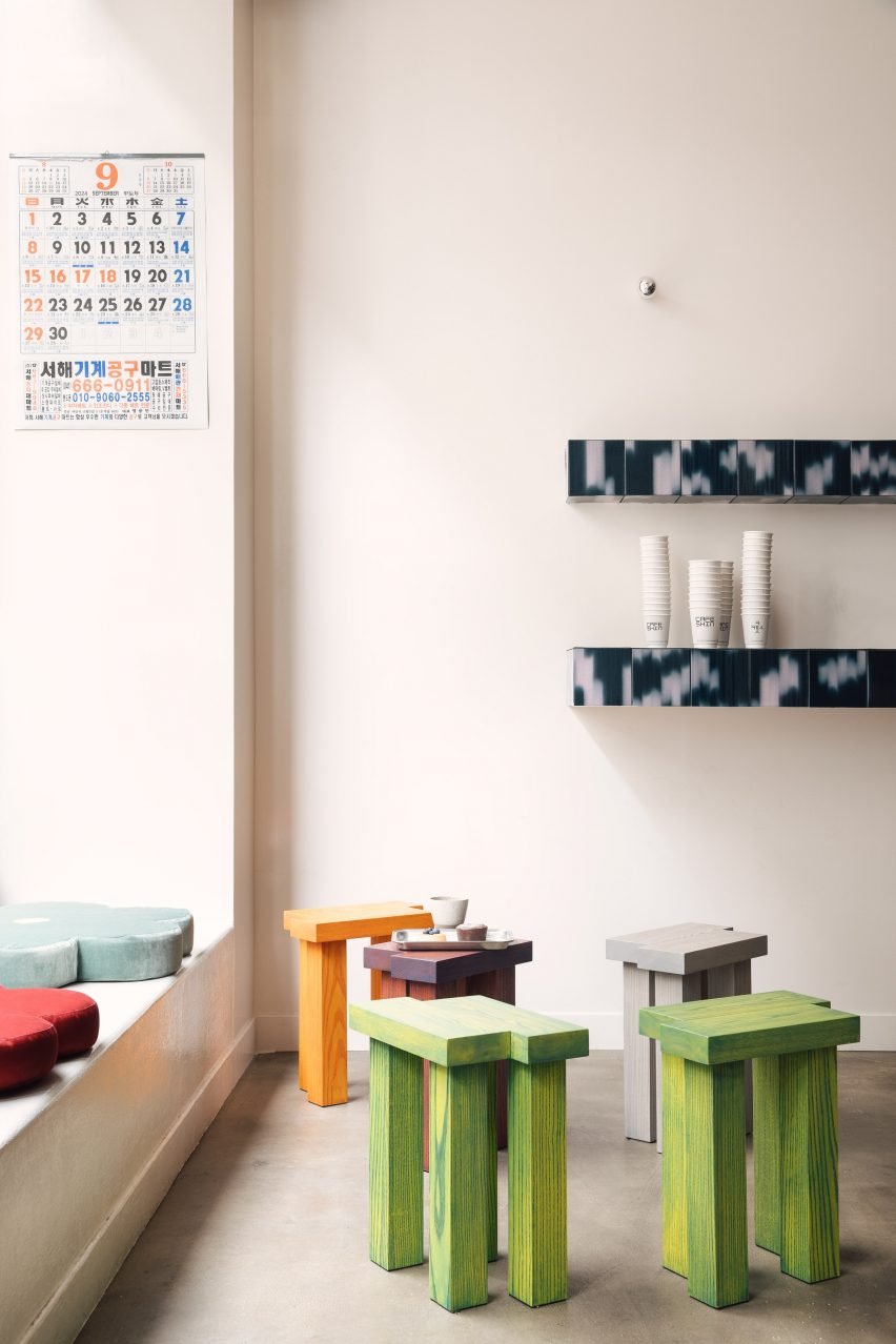 Chunky stools and blue tiles at Cafe Shin