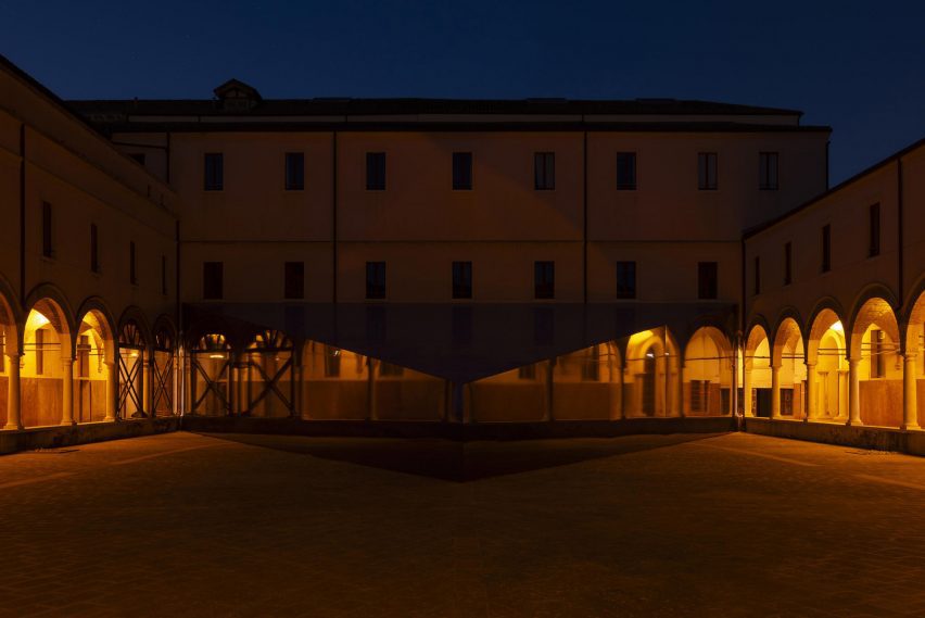 Exterior view of A Pavilion for Swell of Spæcies at night