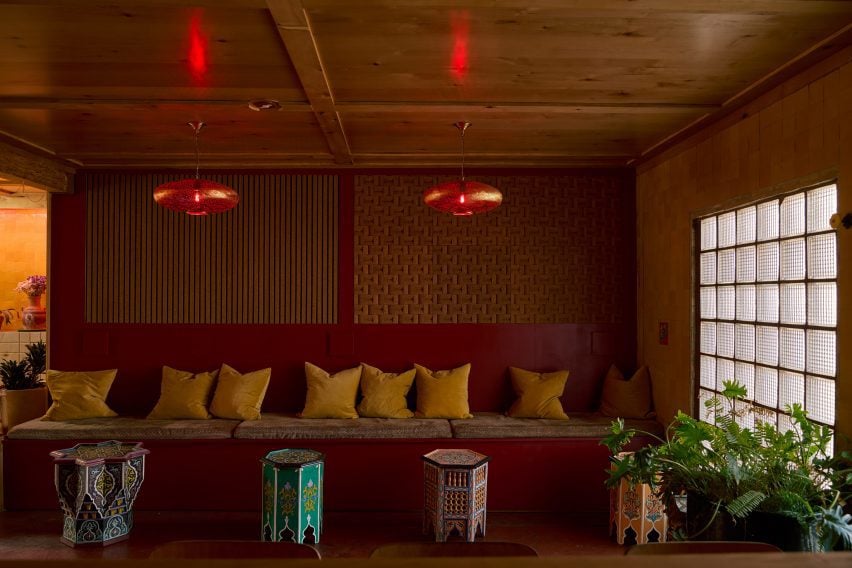 Bar with built-in seating and decorative Moroccan tables