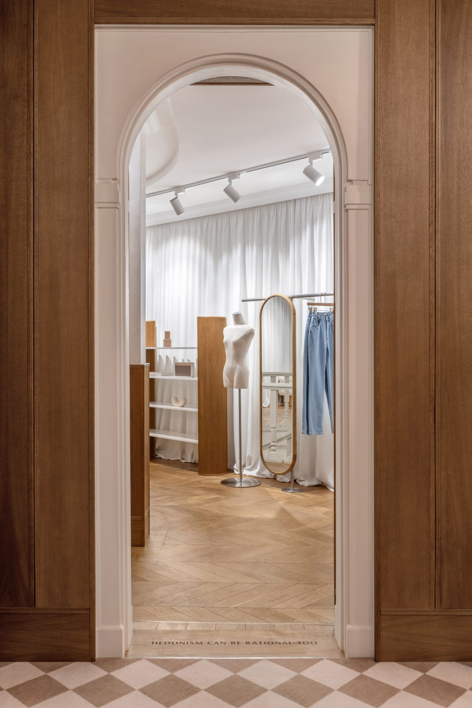 Arched doorways in Friends of Fashion store by 725