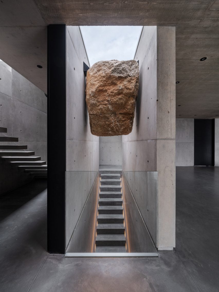 Rock over a concrete staircase