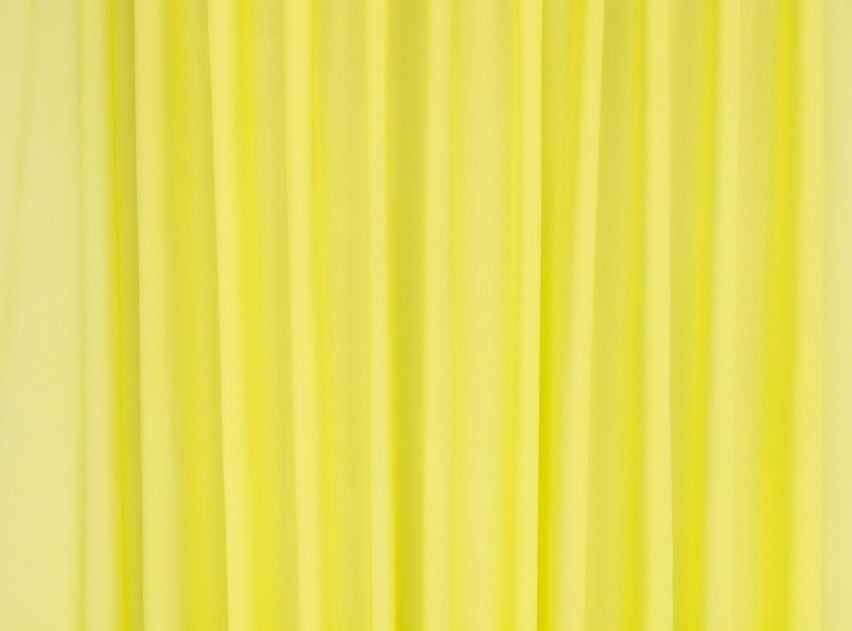 Close-up photo of the Kirkby Design Aloe fabric in a bright acid yellow