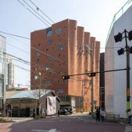 "Curtain-like" brick facade fronts W-Mission office in Seoul