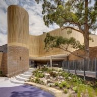 Fjcstudio wraps Sydney school in perforated aluminium facade