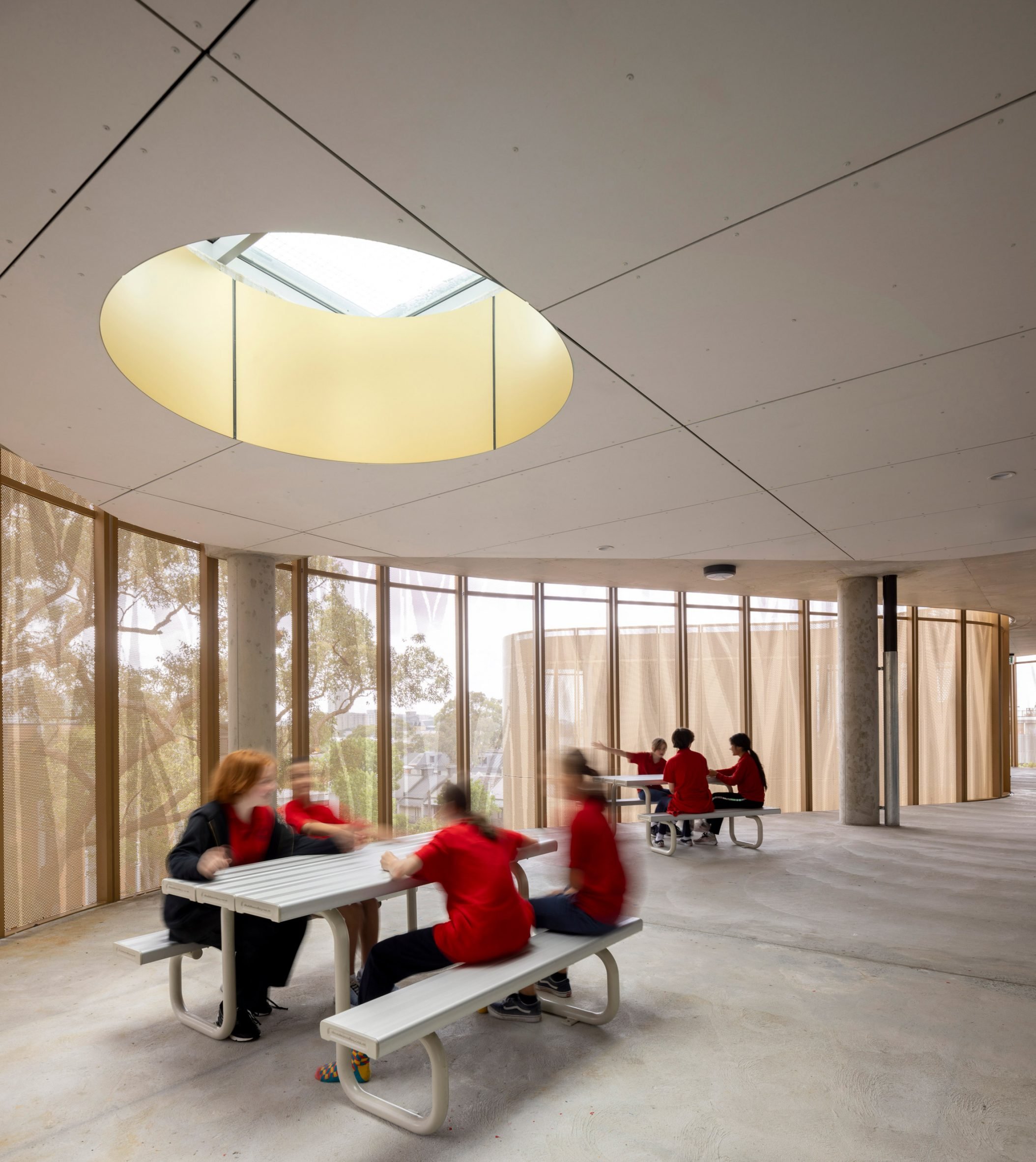 Open-plan learning spaces at community school by Fjcstudio