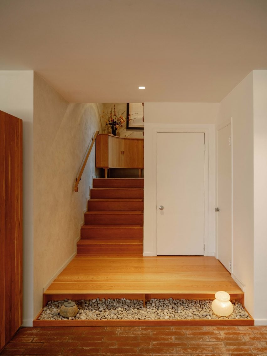 Staircase with a Douglas fir platform at the base