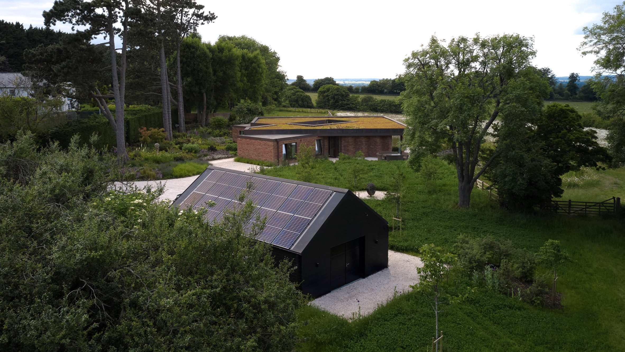 Garage and Foxglove House by Kirkland Fraser Moor