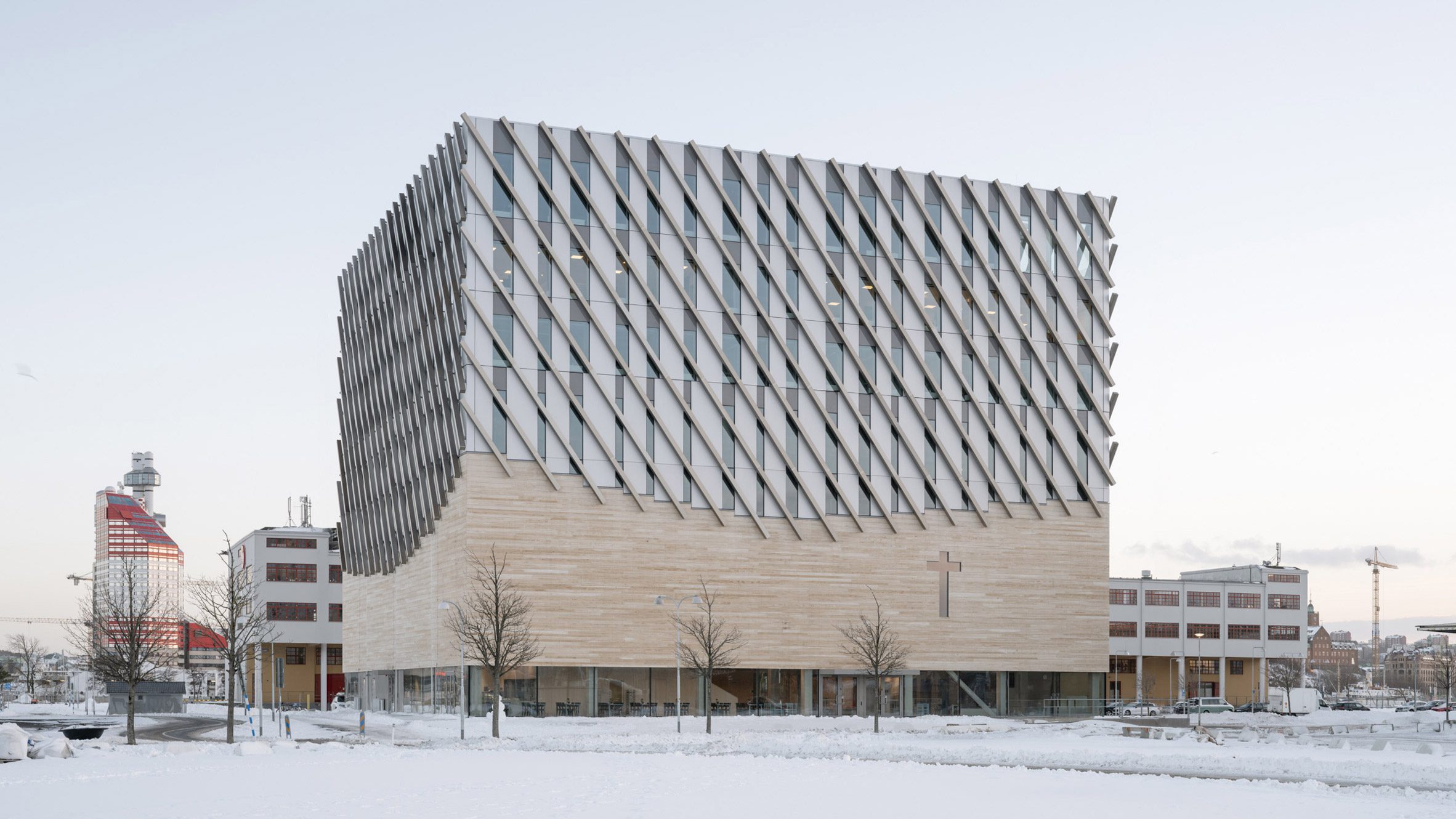 https://static.dezeen.com/uploads/2024/11/frihamnskyrkan-elding-oscarson-architecture-church-gothenburg_dezeen_2364_hero.jpg