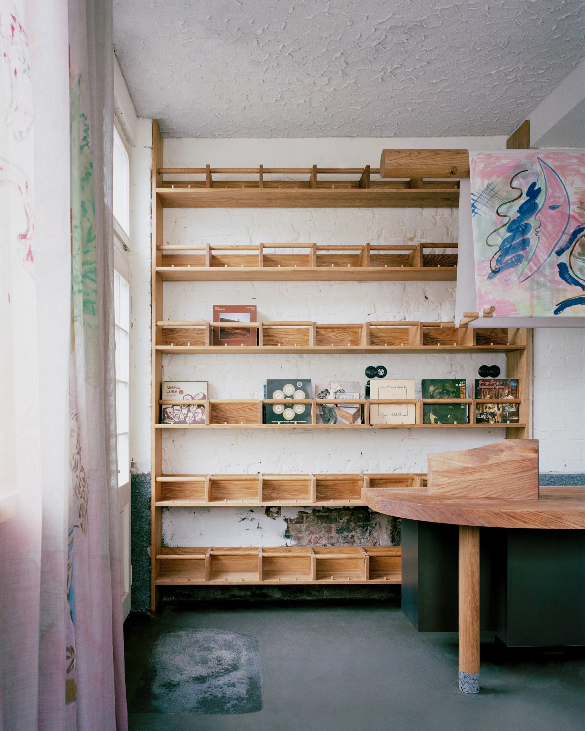 Wooden shelf with records in listening bar