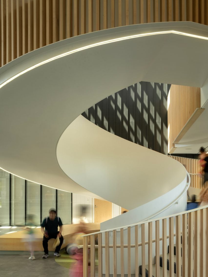 Staircase of təməsew̓txʷ Aquatic and Community Centre by HCMA