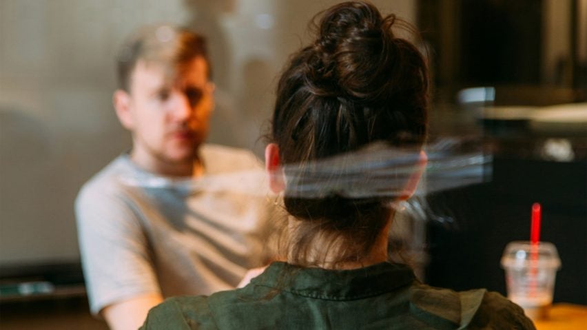 Man and woman at a meeting