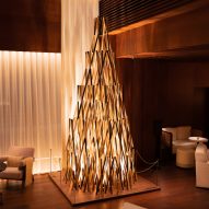 Kengo Kuma creates pair of Christmas trees from timber furniture components