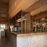 Restaurant interior with wooden and metal furniture