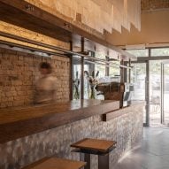 Restaurant interior with wooden and metal furniture