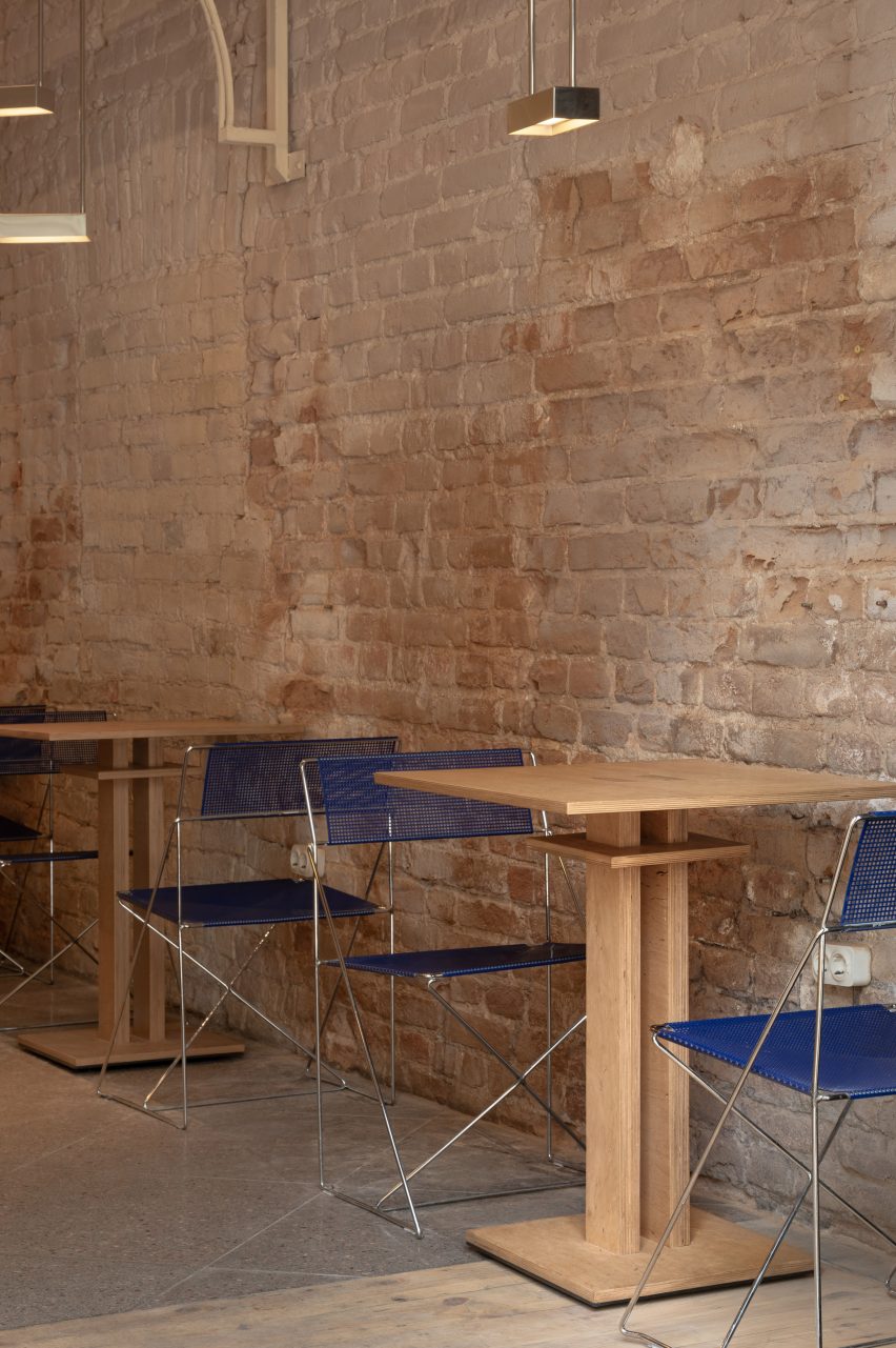 Wooden tables and metal chairs in a restaurant