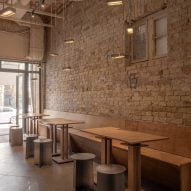 Restaurant interior with wooden and metal furniture