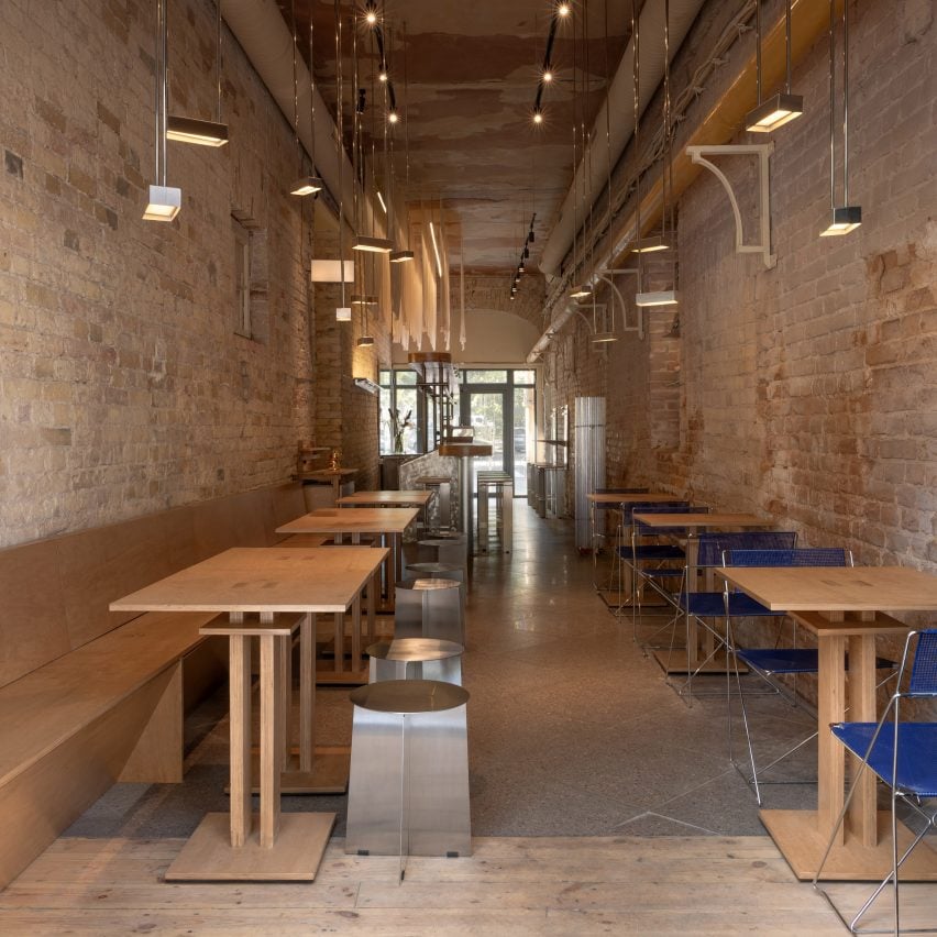 Restaurant interior with wooden and metal furniture