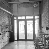 Black and white photo of the interior before remodelling