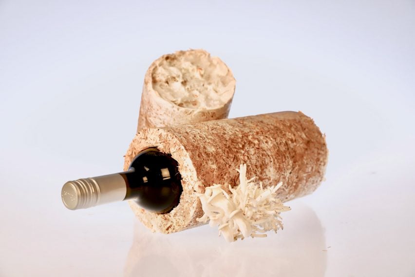 Wine bottle inside tube made from mycelium