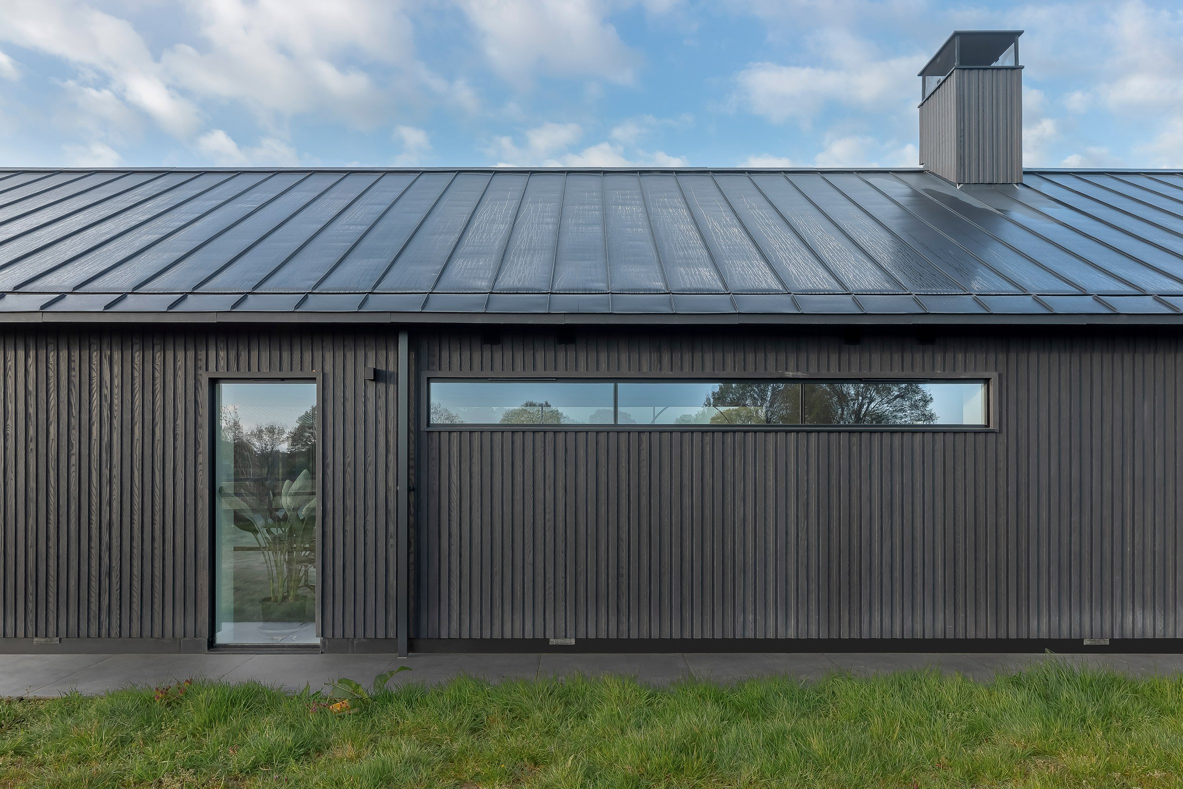 Timber-clad exterior of Weald House in Kent