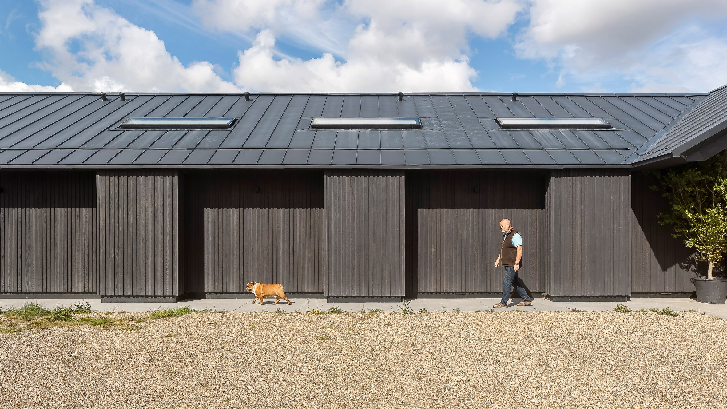 Exterior view of timber-clad home by Mailen Design and Peter Bradford Architects