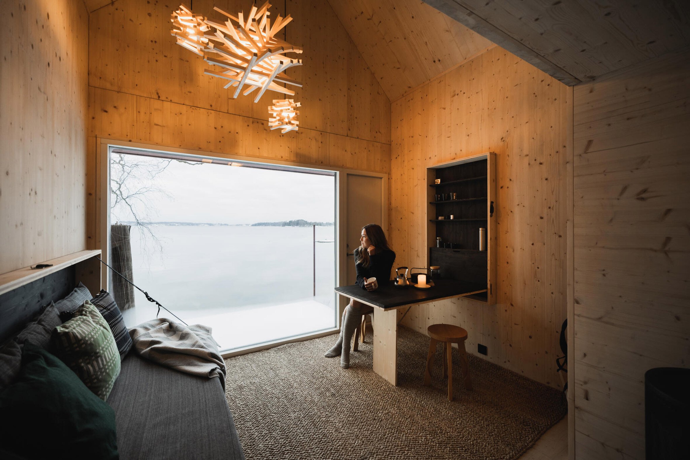 Majamaja Off-Grid Village in Helsinki by Littow Architectes.